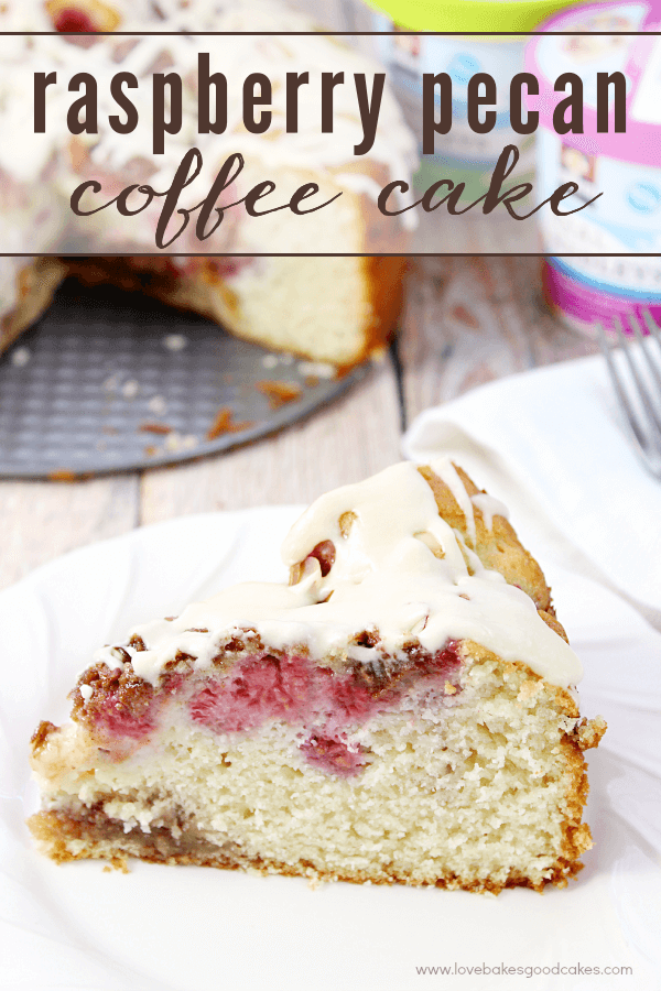 Raspberry Pecan Coffee Cake on a white plate with a fork.