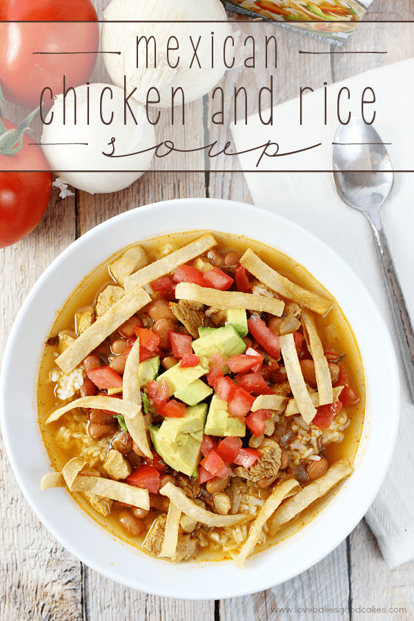 Mexican Chicken and Rice Soup in a white bowl with a spoon.