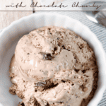 No-Churn Chocolate Cake Batter Ice Cream with Chocolate Chunks in a white bowl with a spoon.