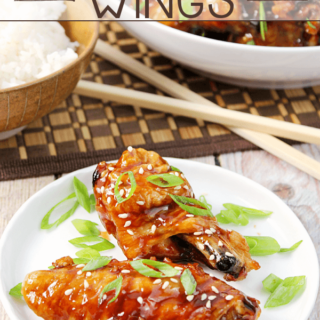 Asian Sticky Wings on a white plate.