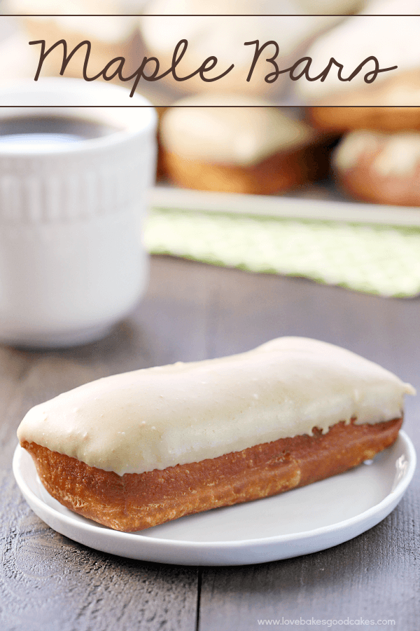 Maple Bar on a white plate with a cup of coffee.