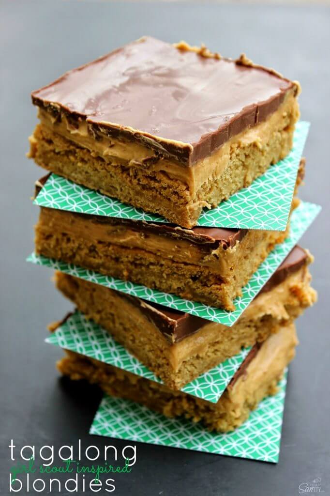 Tagalong Blondies stacked up while showing the side cross cut texture of the food.