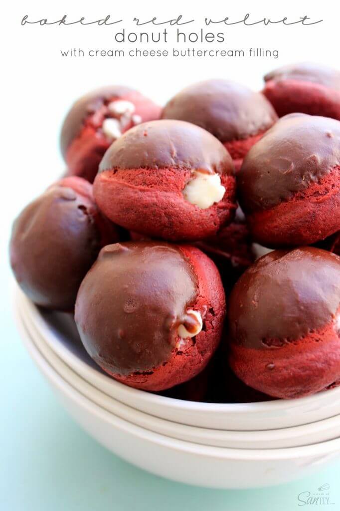 Baked Red Velvet Donut Holes in a white bowl closeup to show texture of food.