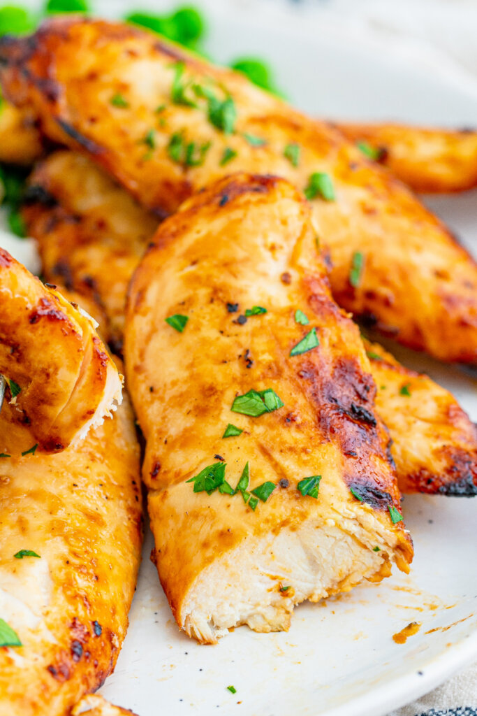 Air Fryer Cracker Barrel Chicken Tenderloin cut in half seeing how moist the inside is