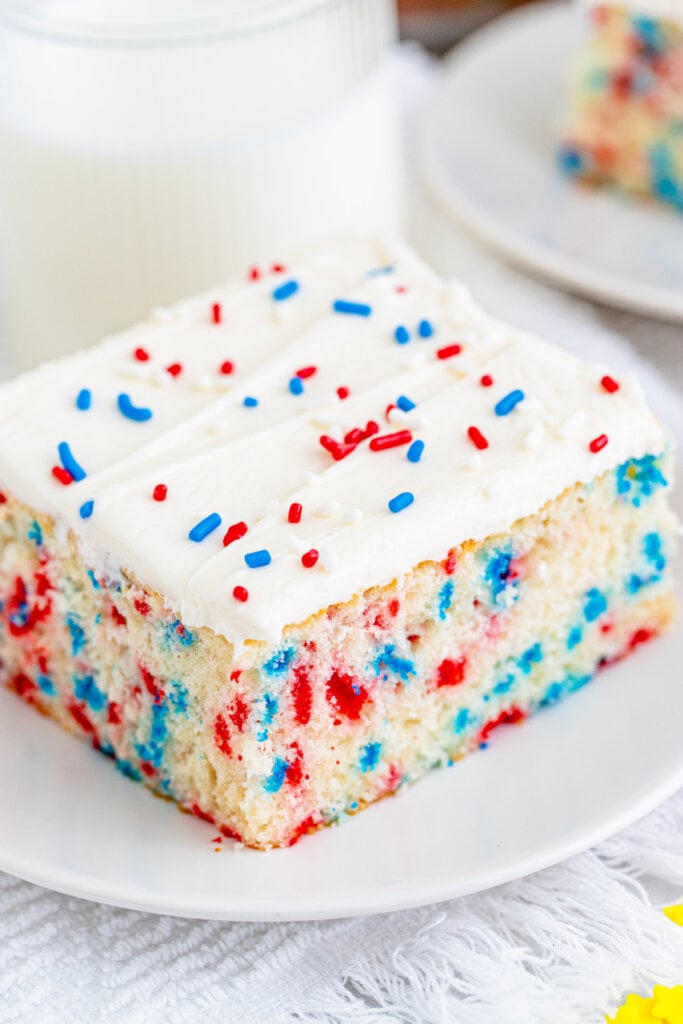slice of patriotic funfetti cake on plate
