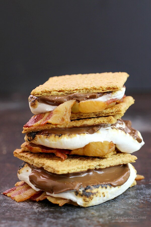 S'mores stacked up on a cutting board.