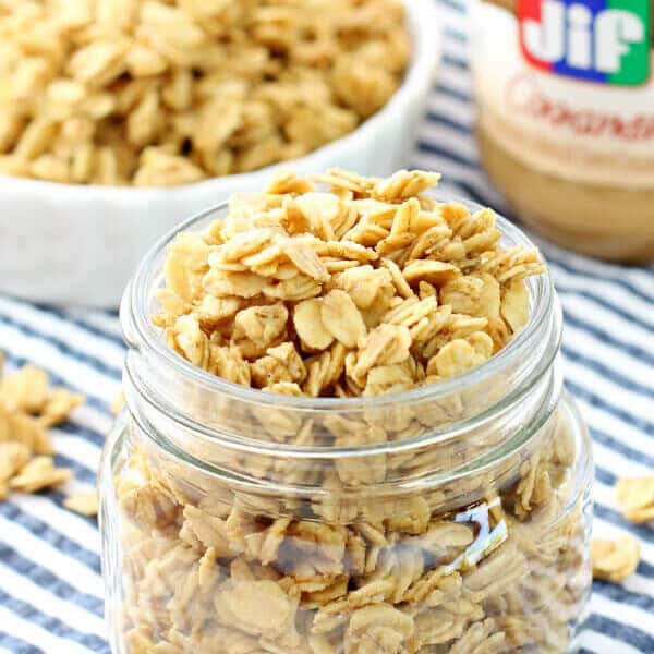 Peanut Butter Granola in a clear jar with granola.