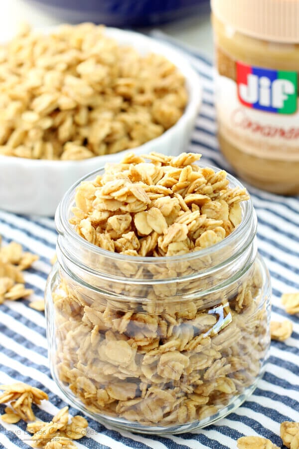 Peanut Butter Granola in a clear jar with granola.