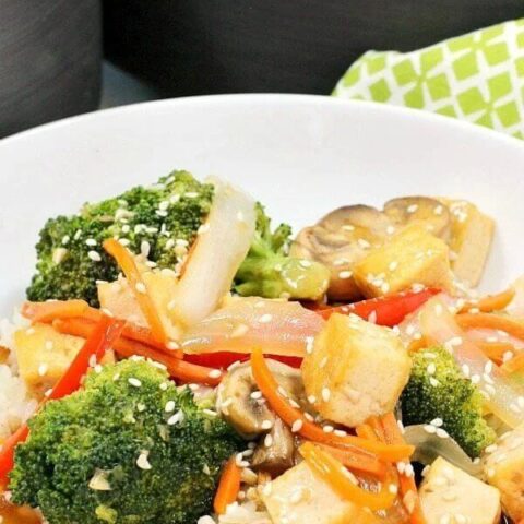 Garlic & Ginger Green Tea Stir Fry in a white bowl.