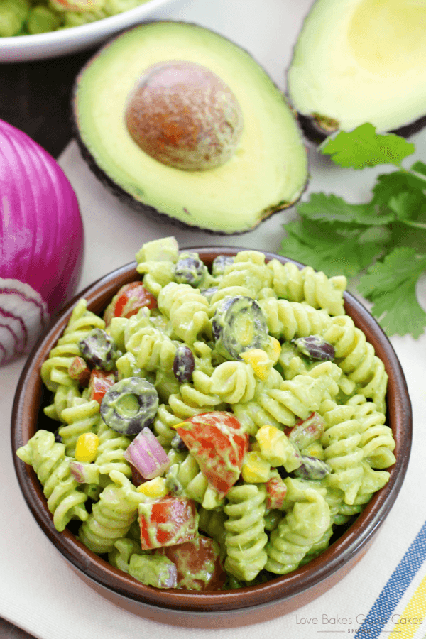 Avocado-Cilantro Pasta Salad in a brown bowl.