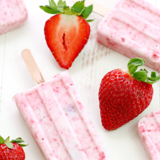 Strawberry-Yogurt Popsicles with fresh strawberries.