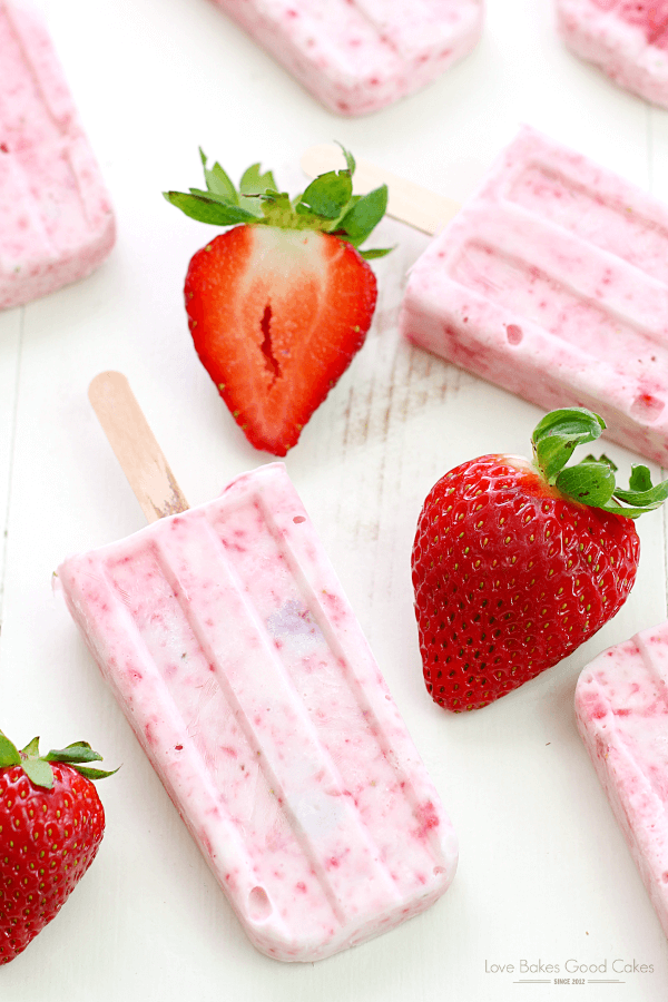Strawberry-Yogurt Popsicles with fresh strawberries.