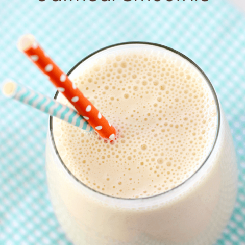 Peach-Banana Oatmeal Smoothie in a glass with two straws.