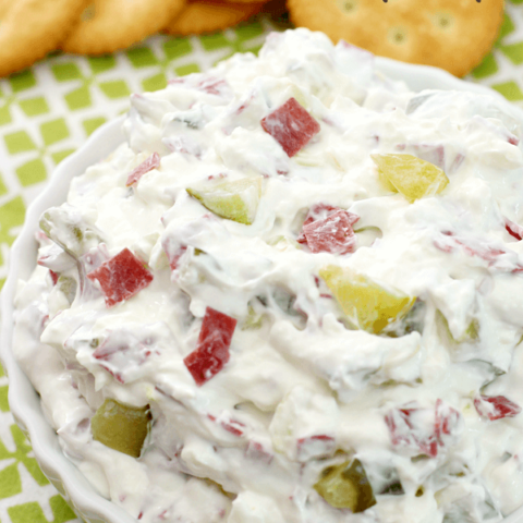 Dill Pickle Wrap Dip in a white bowl with crackers.