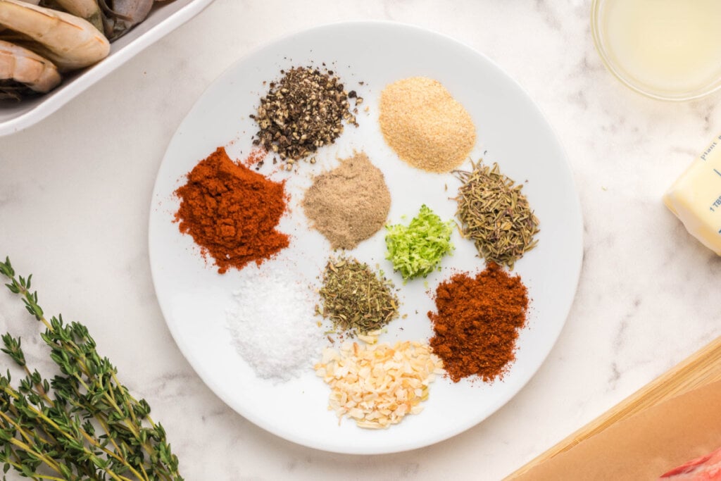 herbs and spices on white plate