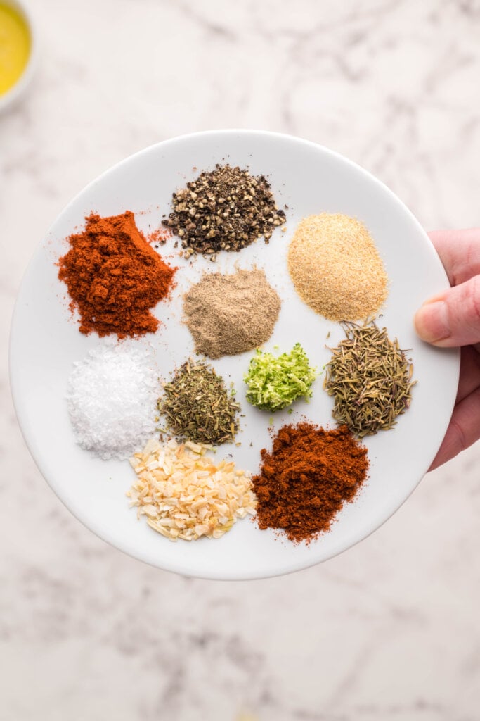 spices and herbs on plate to make Blackened Seasoning