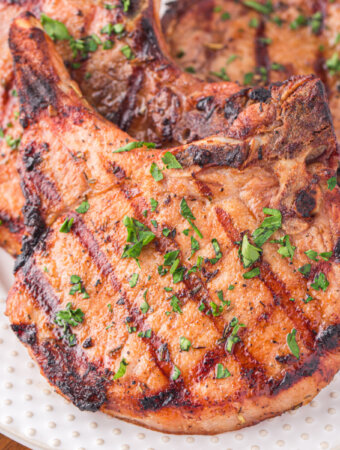 closeup of grilled pork chops on plate