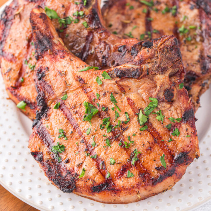 closeup of grilled pork chops on plate