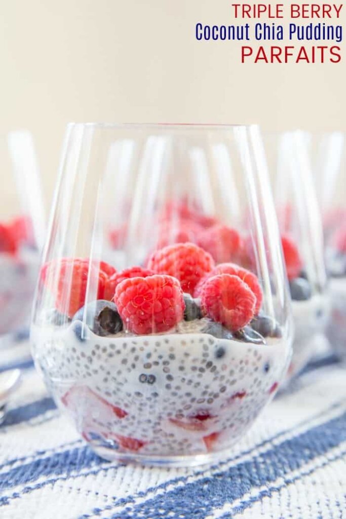 Memorial day parfaits in a glass with fresh fruit.