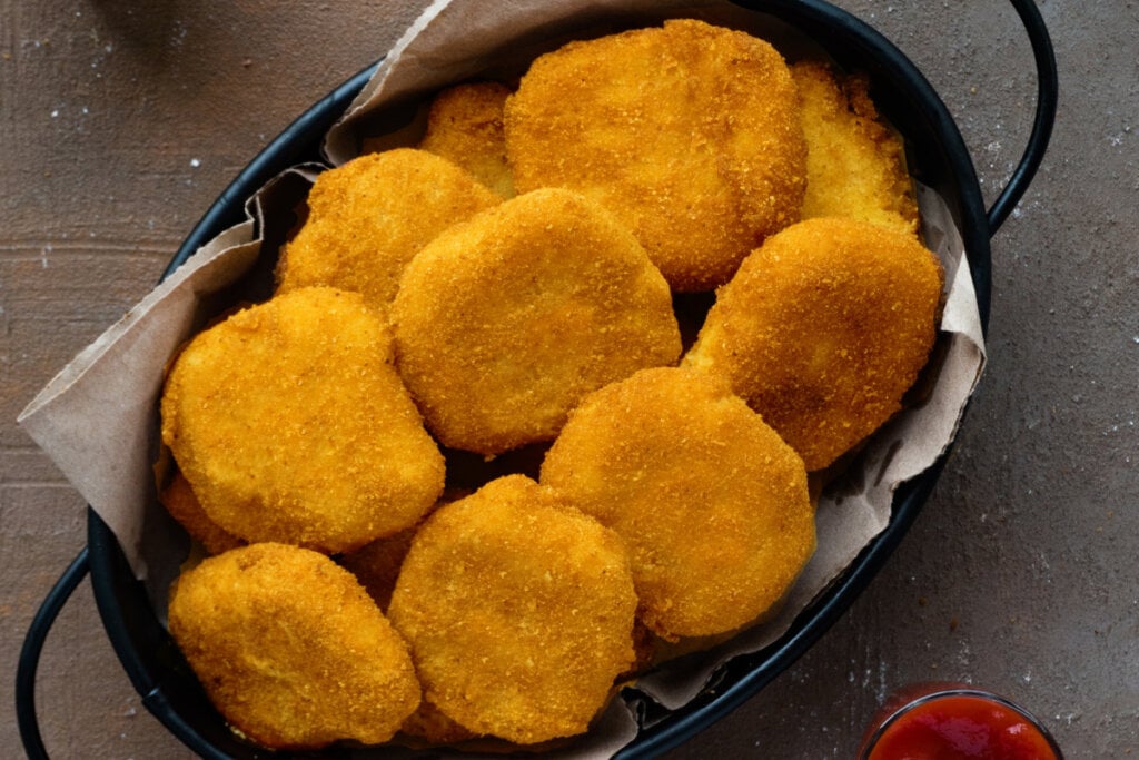 looking down into a basket of homemade chicken nuggets