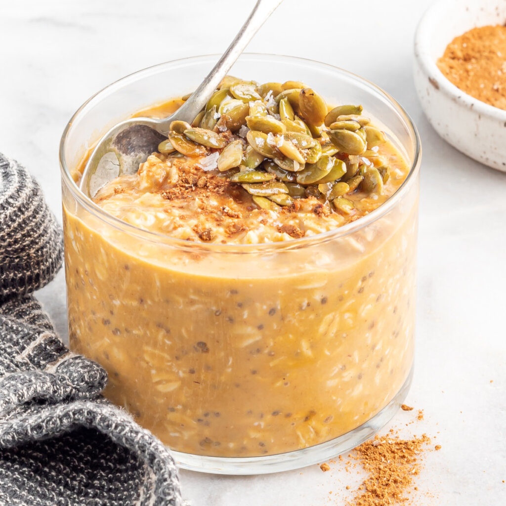 glass bowl with pumpkin pie overnight oats