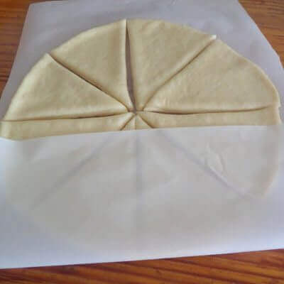Lay parchment paper over the cut slices.
