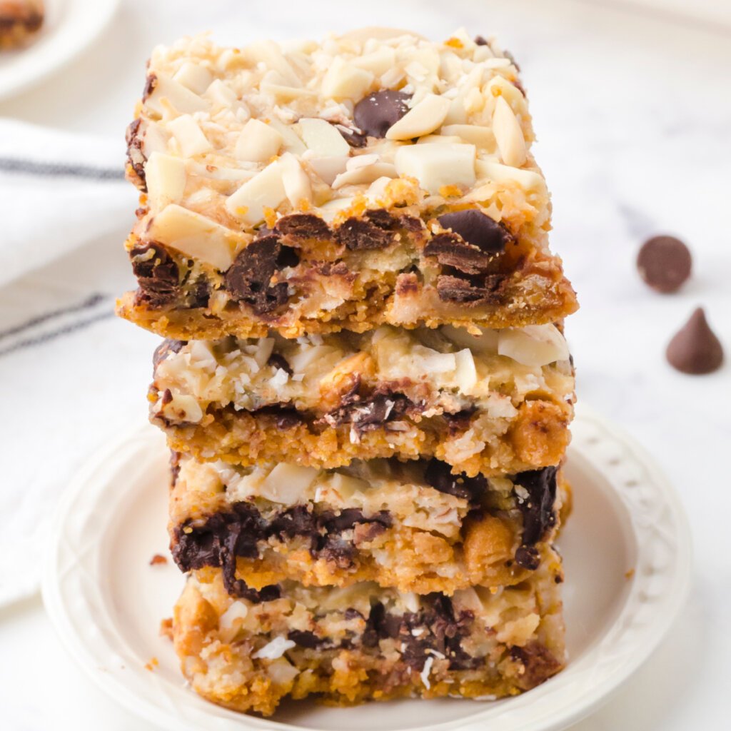 magic cookie bars on white plate