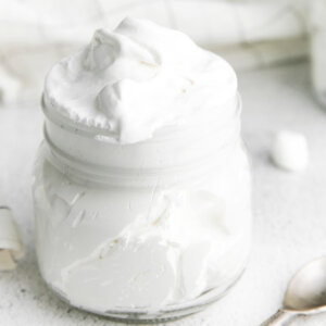 clear jar overfilled with marshmallow fluff