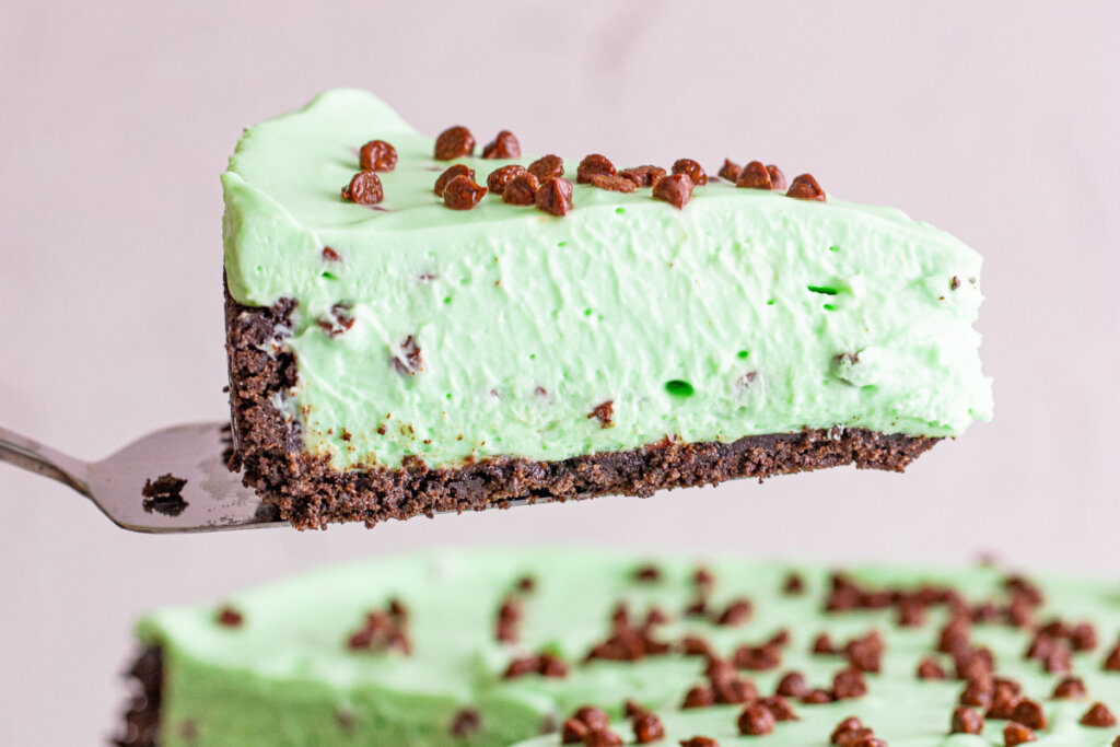 slice of mint chocolate chip cheesecake on serving utensil