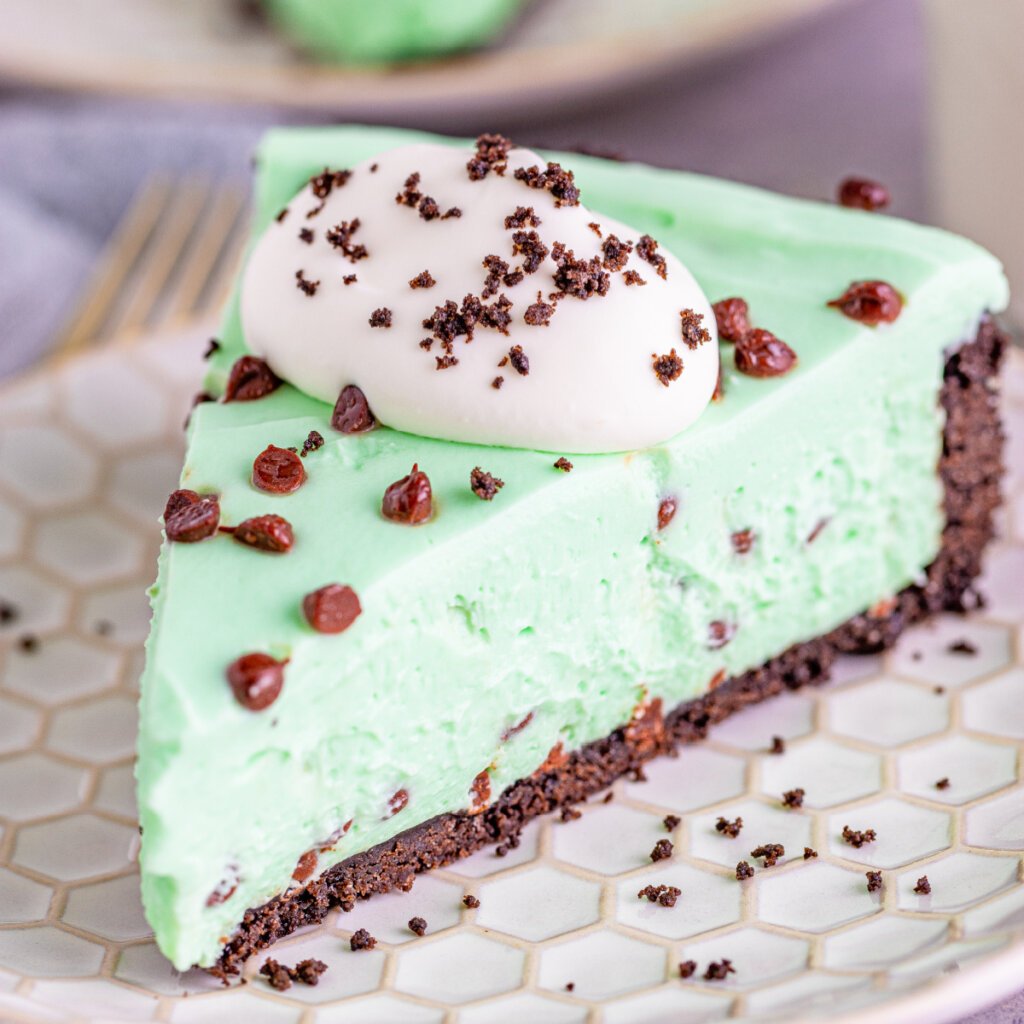 closeup of mint cheesecake slice on plate