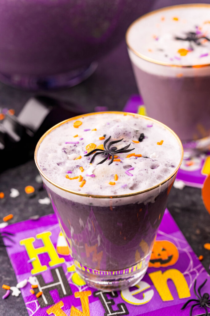 glass of purple halloween punch