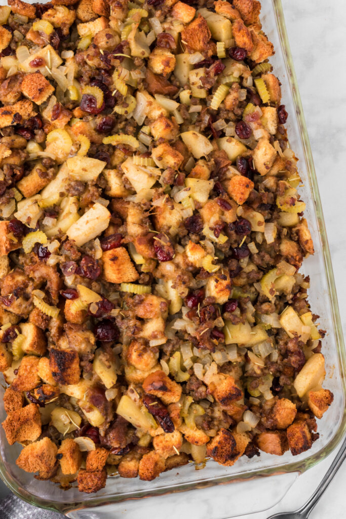 cranberry apple sausage stuffing in baking dish