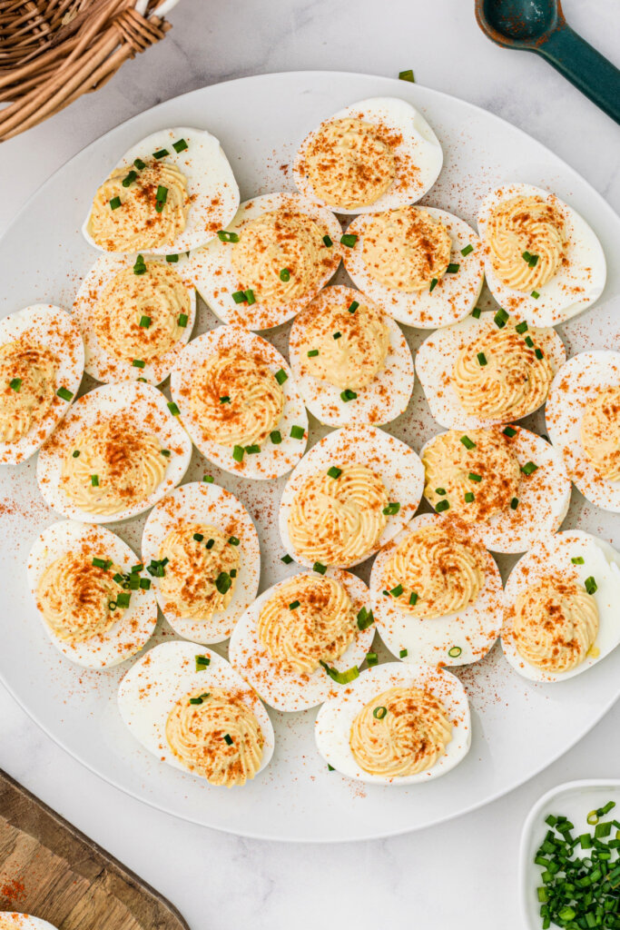 lookin down onto a plate filled with horseradish deviled eggs