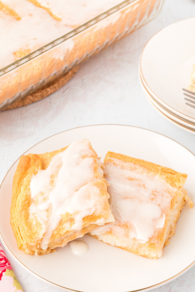 two cheese danish squares on a white plate