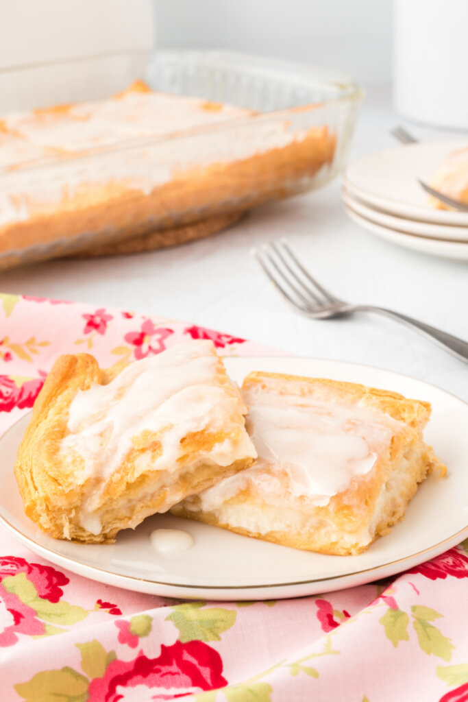 cheese danishes on plate on pink flowery towel