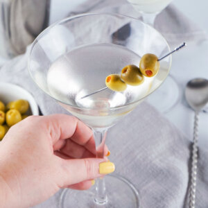 hand holding martini