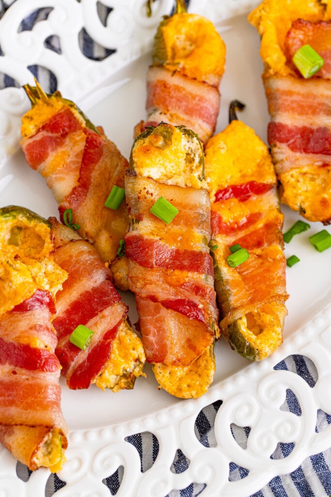 bacon wrapped jalapeno poppers on plate