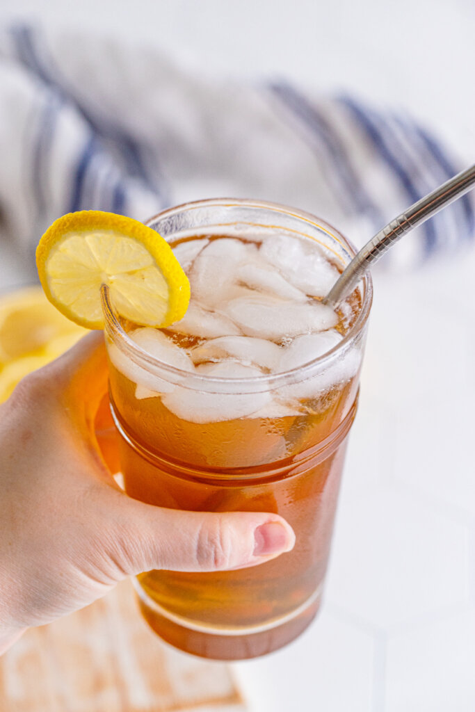 hand holding long island iced tea