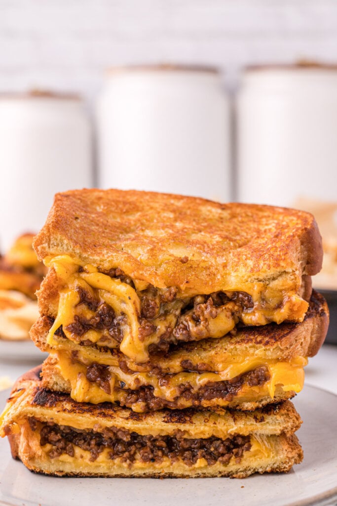 sloppy joe grilled cheese halves stacked on topof each other