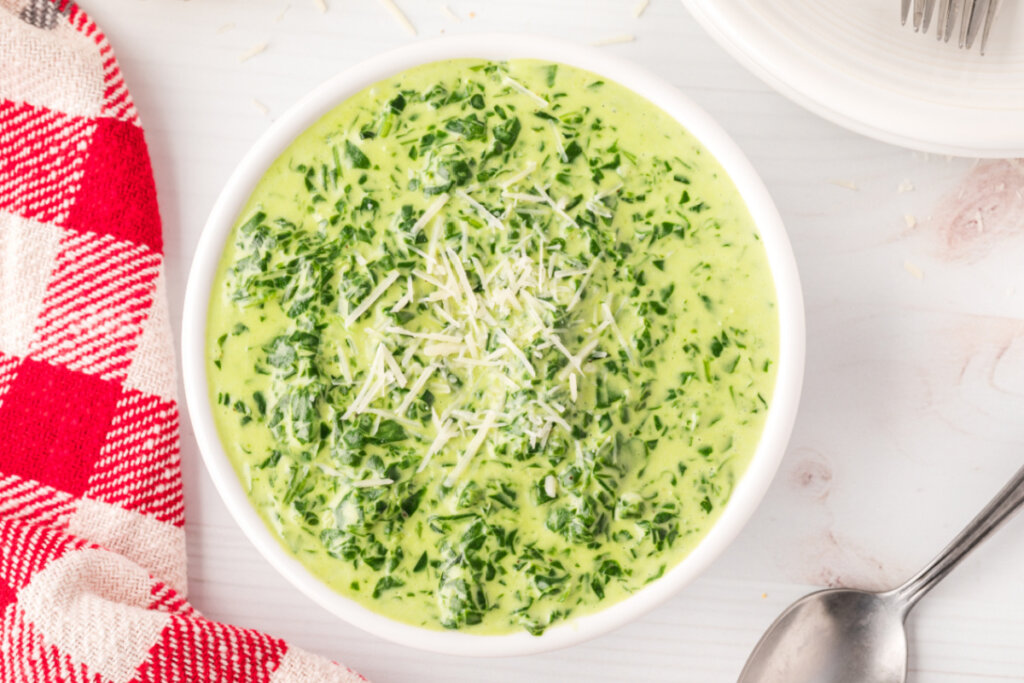 looking down into a bowl with creamed spinach