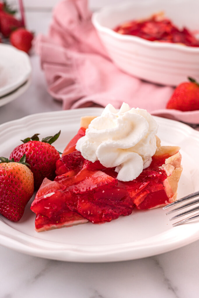 slice of strawberry pie on plate