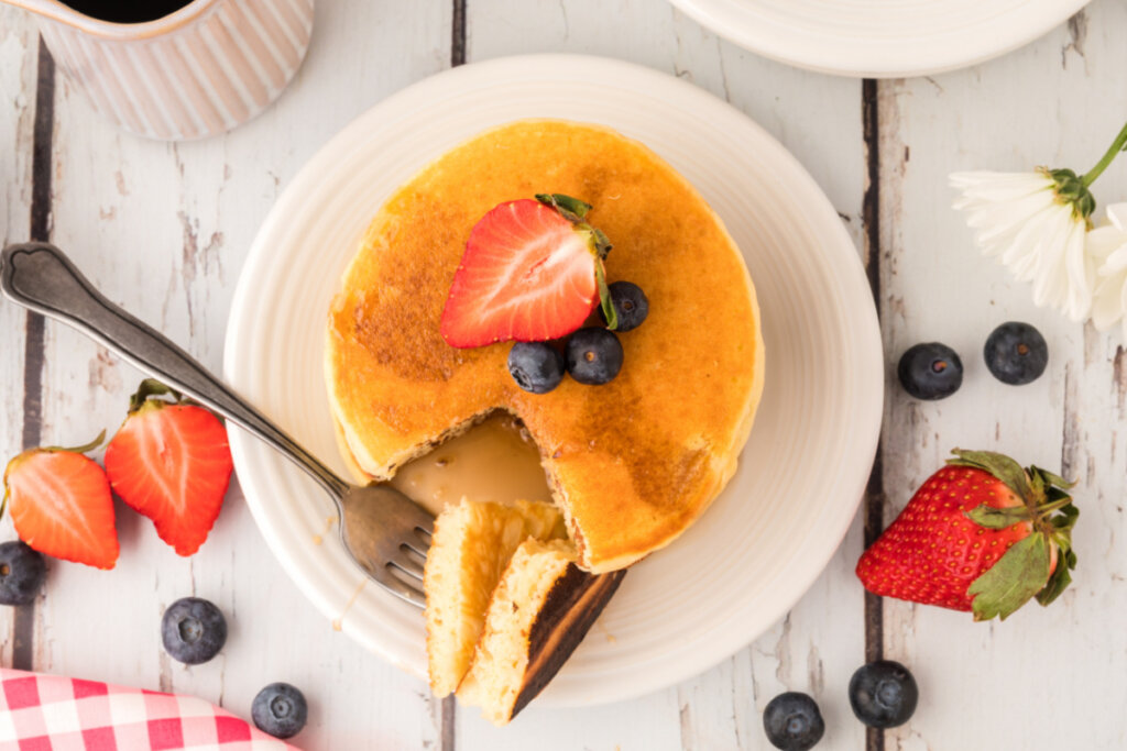 stack of buttermilk pancakes on plate