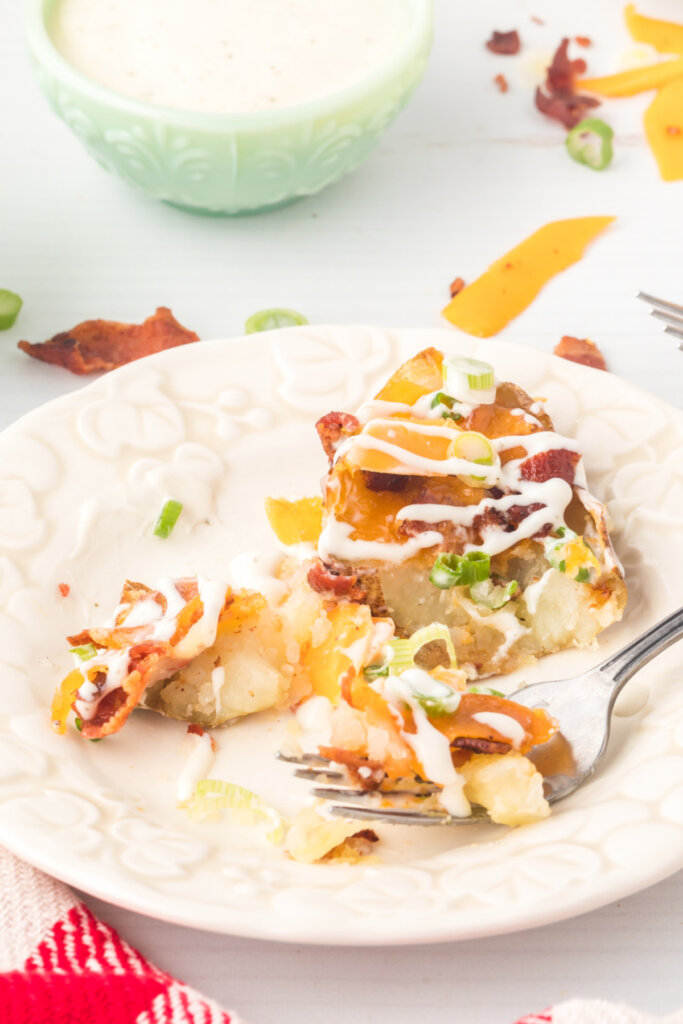 potato skin on plate being eaten