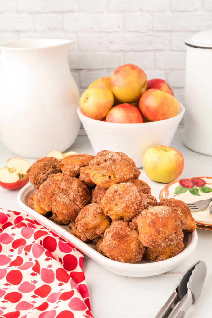 batch of apple fritters in serving platter