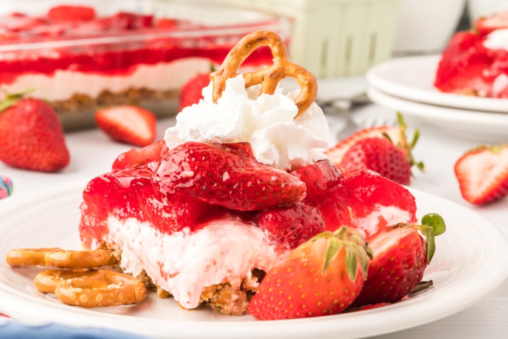 slice of strawberry pretzel salad on plate