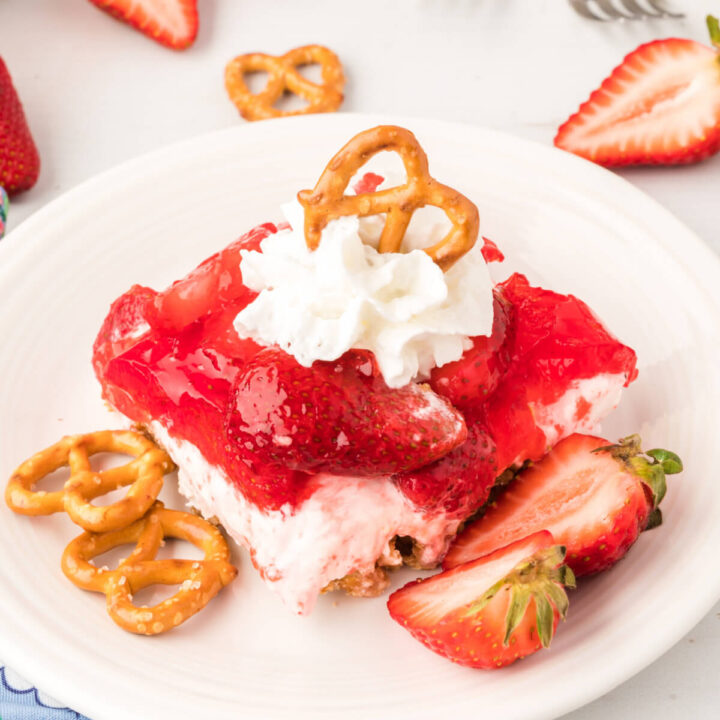 strawberry pretzel salad slice on plate