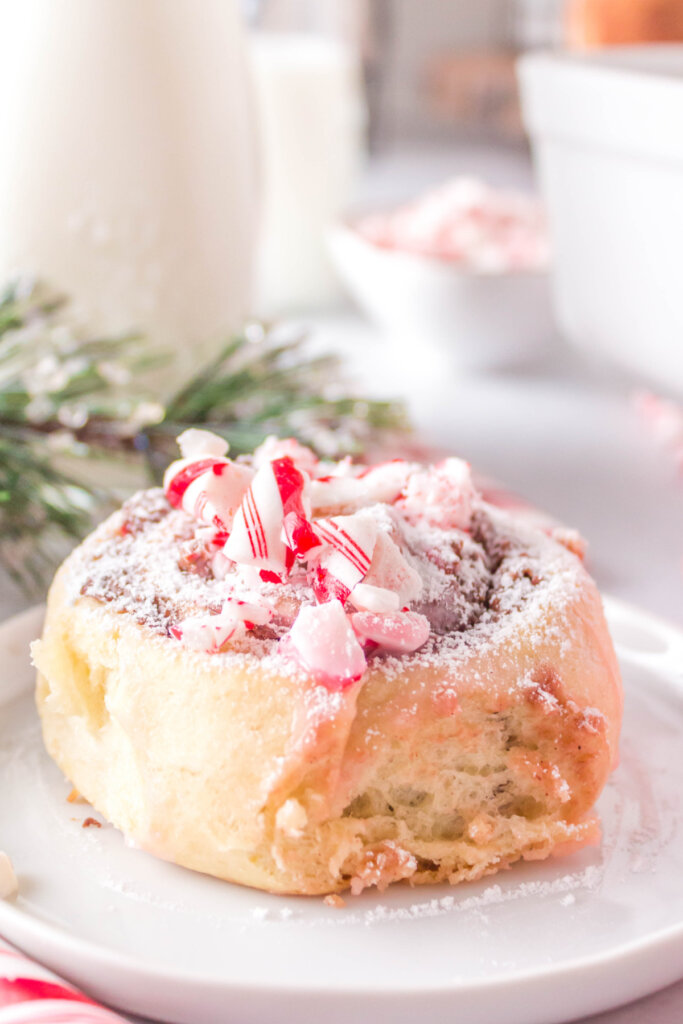 candy cane cinnamon roll on plate