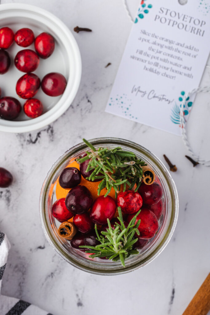 holiday stovetop potpourri packed into a jar as a gift