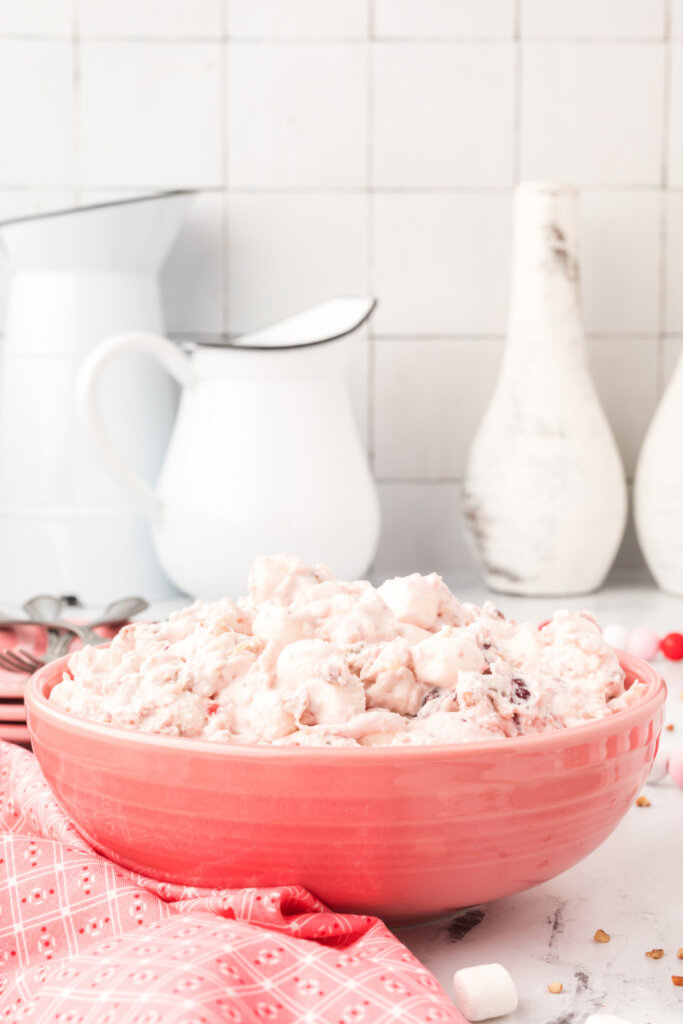 cranberry fluff salad in pink bowl