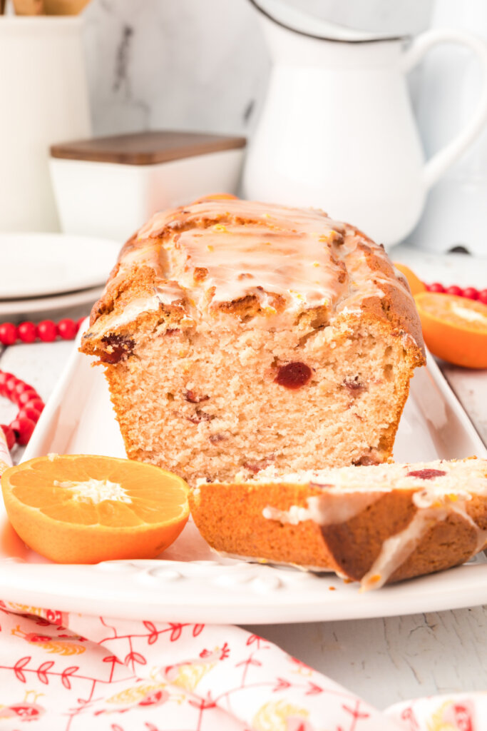 loaf of orange cranberry bread sliced open